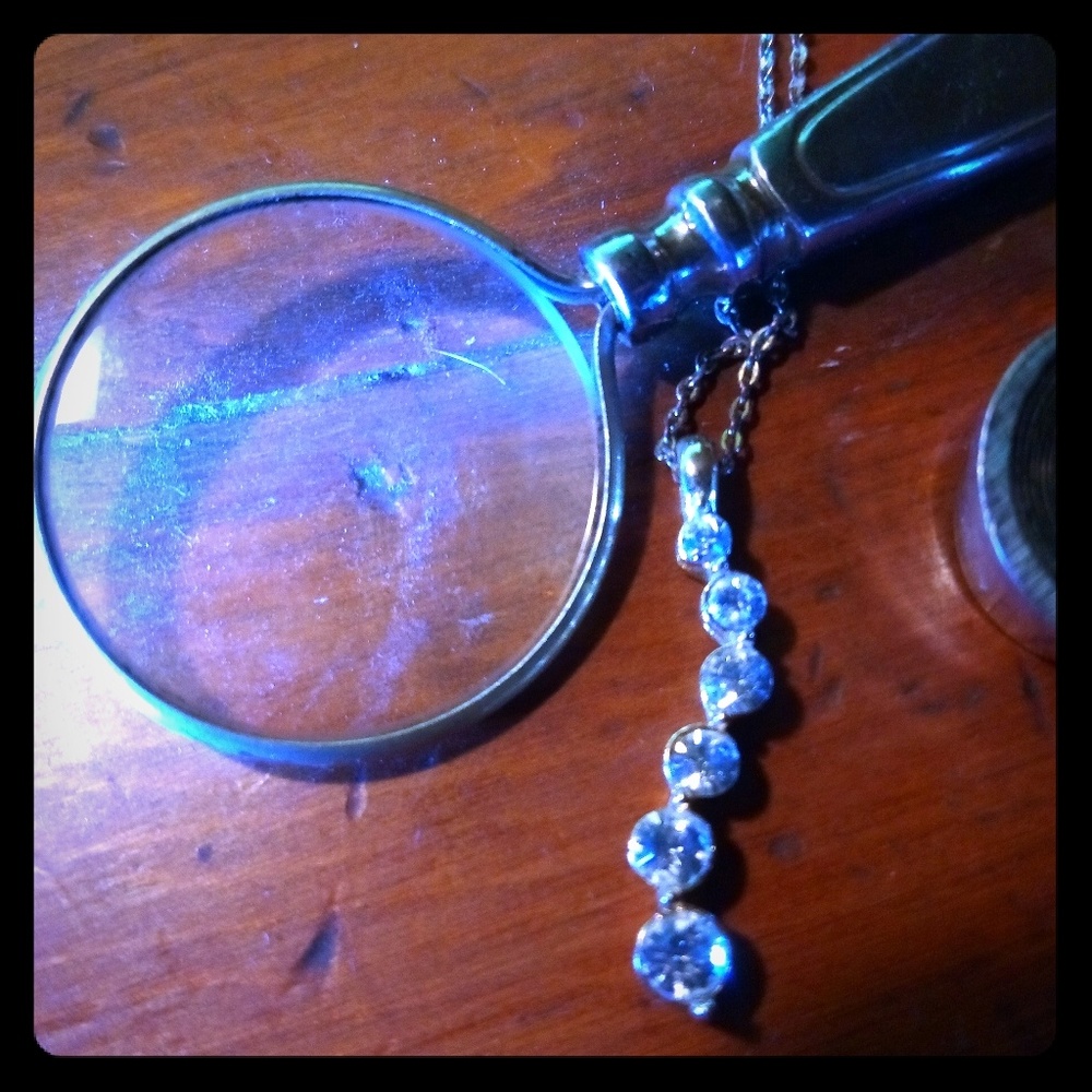 6 Stone 0.66 total ct. Weight Diamond Pendant.